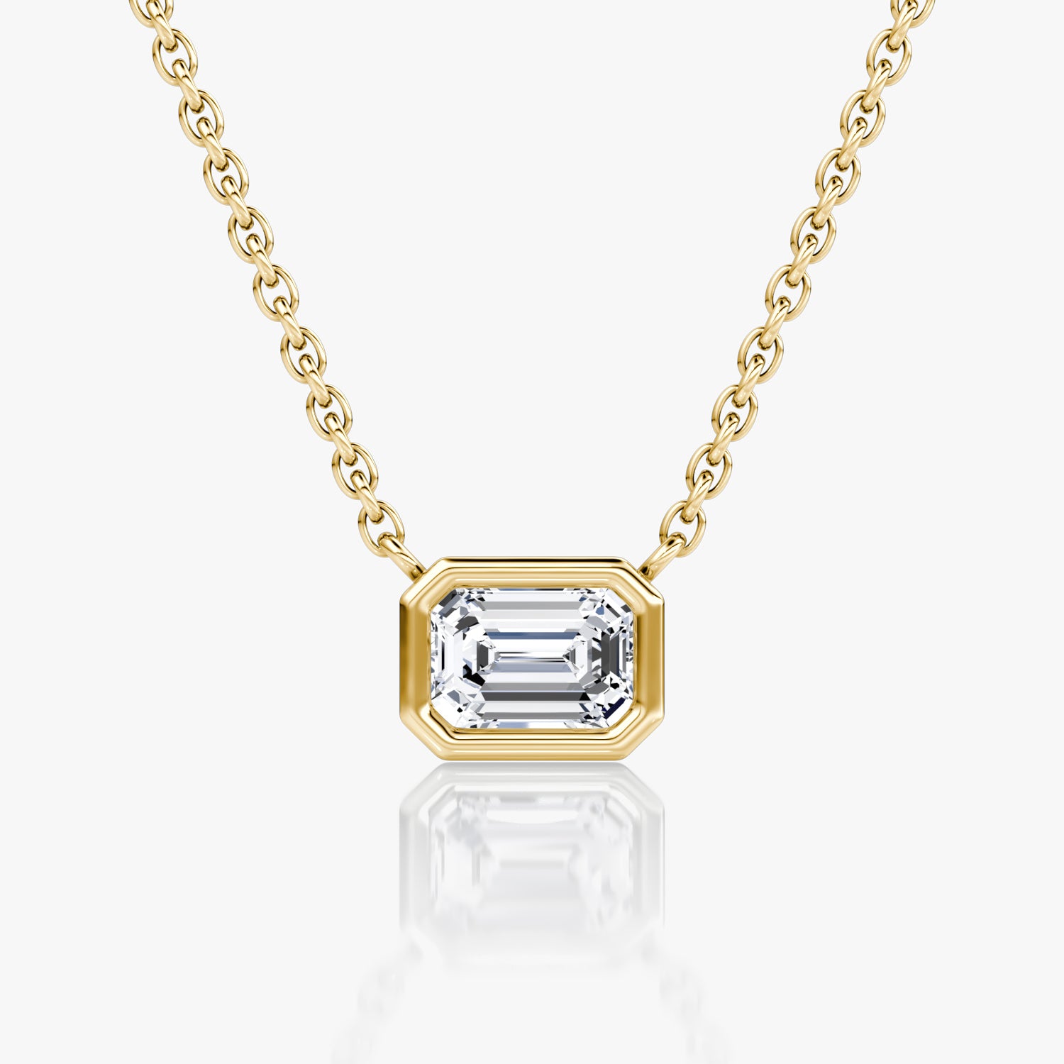 Ariston Bezel Set Solitaire Emerald Moissanite Necklace