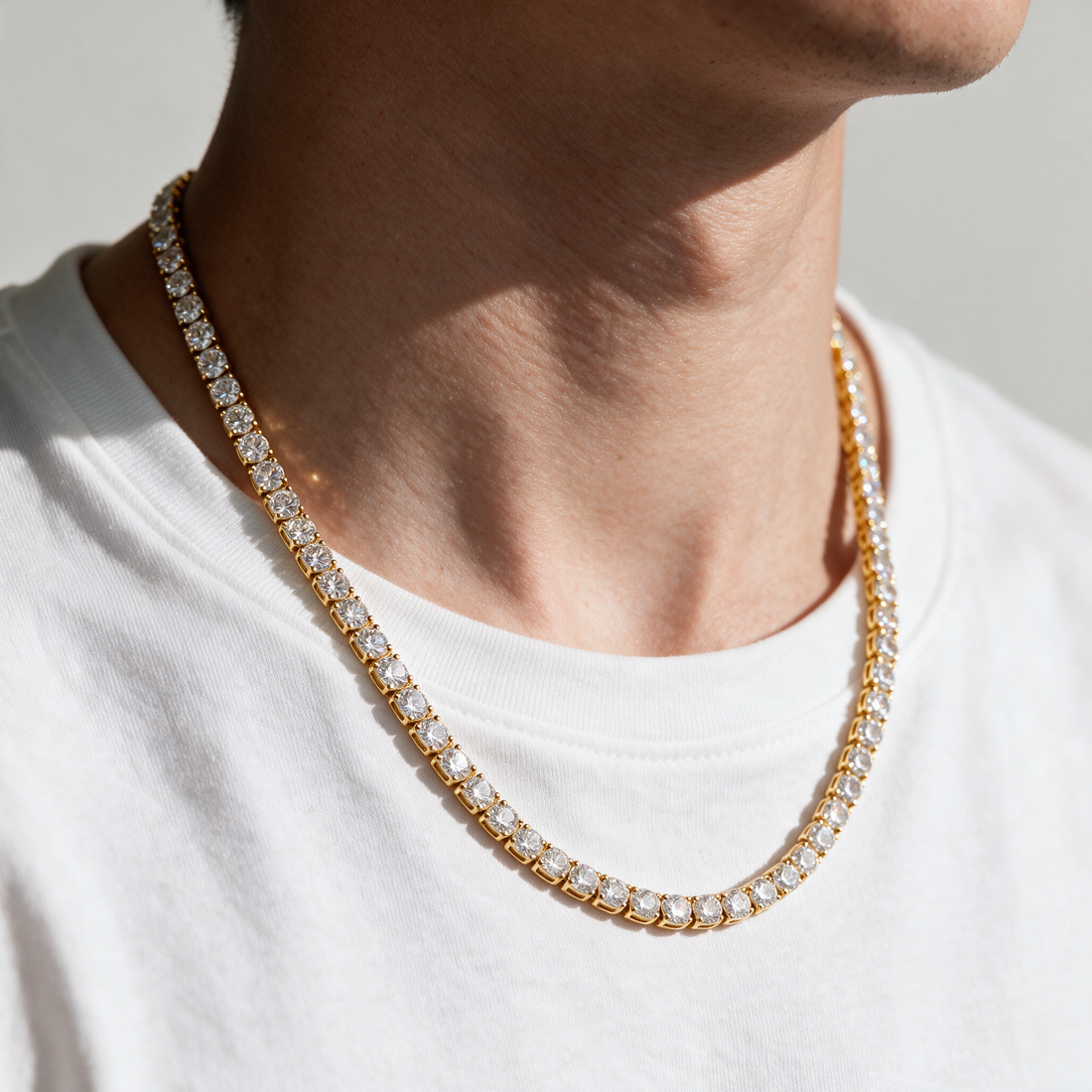Atlas Moissanite Tennis Chain worn by a man in 14k Gold